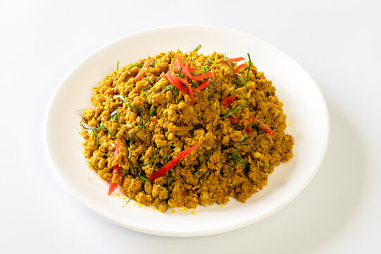 Southern Stir-Fried with Yellow Curry Paste on white background, Thai food