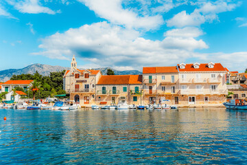 Obraz premium Fishing village of Sucuraj on Hvar island, traditional stone houses, a peaceful harbor and blue Adriatic sea, Croatia.