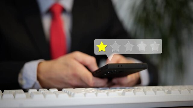 Close up of a customer typing on a smartphone with digital overlay of one customer rating star as negative feedback complaint for luxury services
