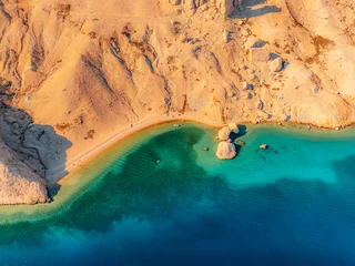 Fototapeten Mediterranes Europa Rucica beach in Metajna on Pag island curved shoreline, crystal-clear turquoise sea, sunlit barren terrain and rocky Adriatic sea  © Zedspider
