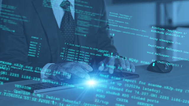 The concept of a man working in an office and digital technology.