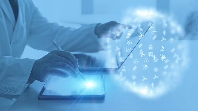 オフィスで作業する白衣の男性と科学テクノロジーのコンセプト