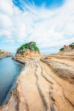 Cape Drastis, natural landscape with white rocks and turquoise waters, northern part of Corfu island, Ionian islands of Greece