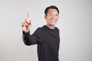 Fototapeta premium Man Showing Different Hand Gestures Isolated on Gray Background, Presentation and Communication Concept