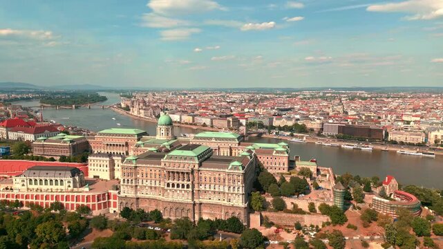 Budapest Buda Castle aerial view. Castle crowns historic Buda hill. Castle Budapest cityscape. Budapest capital of Hungary drone video panorama. Budapest Buda Castle skyline.