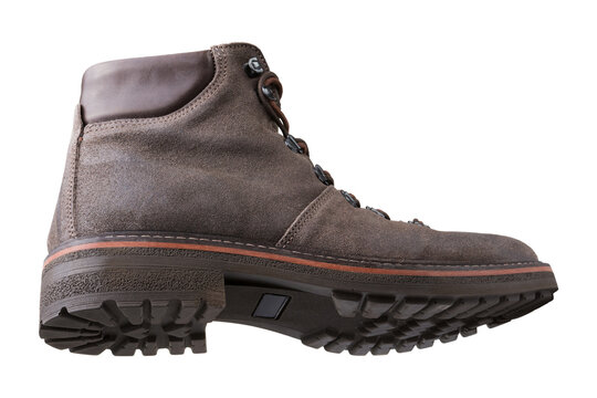 Men brown suede hybrid sneaker boot isolated on white background. Casual winter leather ankle hiking boot with rugged sole, side view.