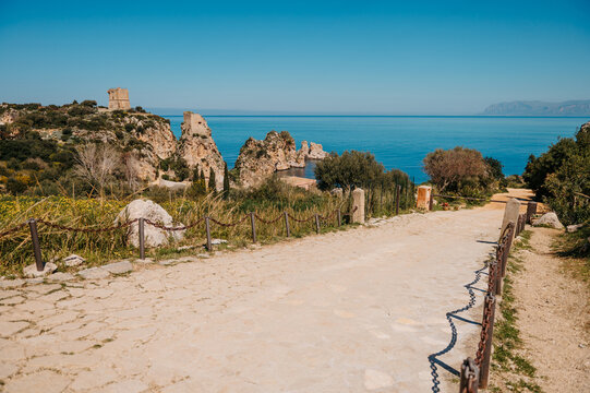 Entrance to Tonnara di Scopello with coastal views in Sicily, Italy