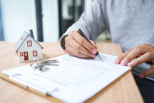 Real Estate Contract Signing For Property Purchase Mortgage