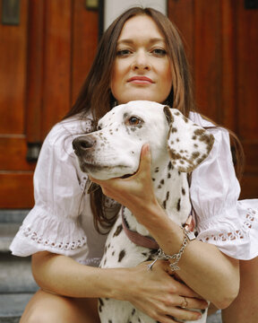 dalmatian dog near owner on the street in Amsterdam