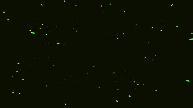 Abstract green dots floating on a black background