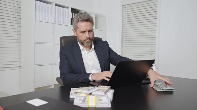 Businessman at office desk with money counting machine. Finance expert. Banker money counting in office. Banking process with cash. Business success with cash counting.