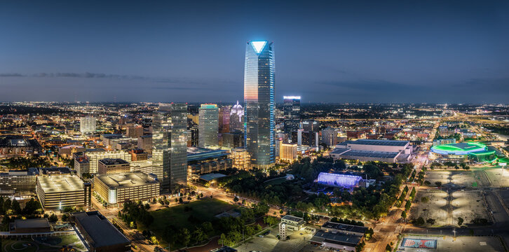 Aerial view of the Oklahoma City skyline at night.