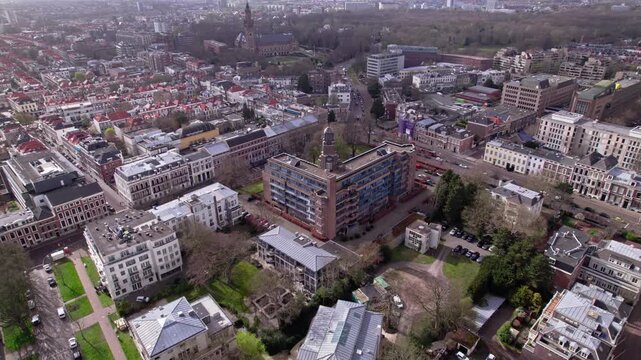 Dutch political and justice capital The Hague. Cityscape seen from above with diplomat neighbourhood in the foreground and peace palace in the background
