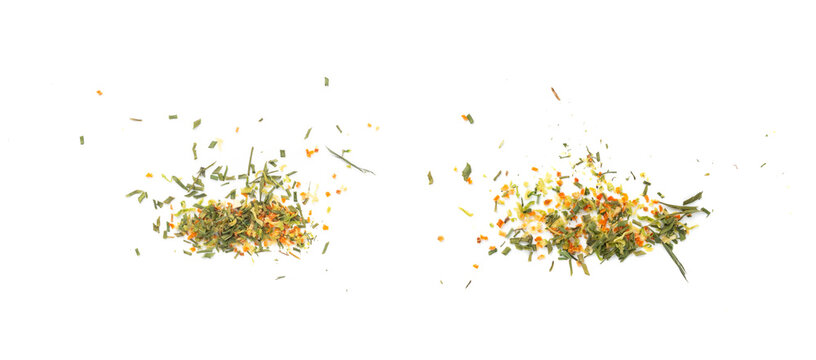 Dried vegetable mix isolated. Dehydrated greens, onion, carrot pieces, seasoning chips, flakes