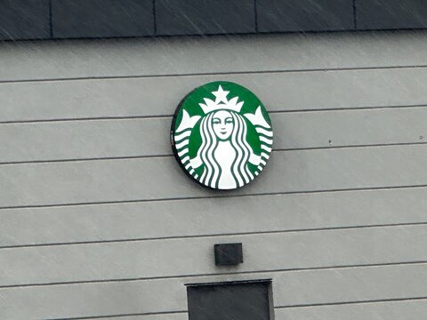 Starbucks Coffee Store Exterior with Green Logo Signage. June 1 2026. Strathmore Alberta Canada. For editorial use only