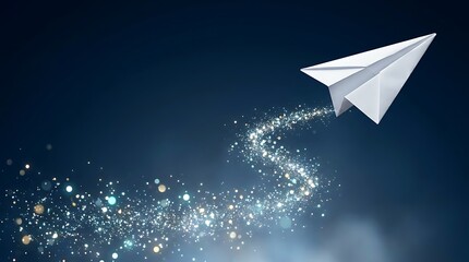 Fototapeta premium Paper airplane flying across dark blue background with sparkling glitter trail leaving magical stardust behind for inspiration success and ambition business themes.
