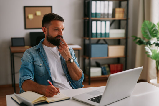 Business professional reviewing information and planning next steps