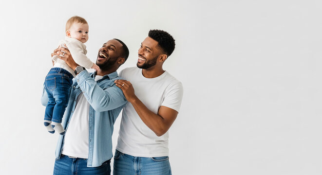 Two men with a baby against a white background, depicting family, happiness, and togetherness, symbolizing love and belonging