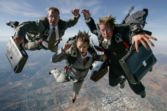 businessmen and woman skydiving into to where they are needed, troubleshooters, company bailout