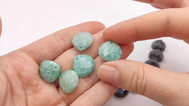 These smooth amazonite hearts feature a subtle faceted finish and a top-drilled hole, providing a beautiful teal accent for creating custom necklaces, bracelets, and jewelry accessories