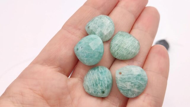 These smooth amazonite hearts feature a subtle faceted finish and a top-drilled hole, providing a beautiful teal accent for creating custom necklaces, bracelets, and jewelry accessories