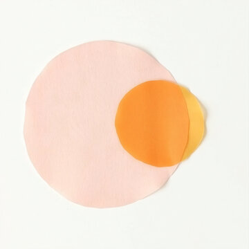 paper collage minimal art two intersecting translucent tissue paper circles pale pink pale yellow soft orange
