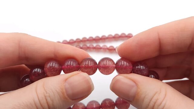 These polished strawberry quartz beads feature delicate red inclusions within clear stones for high quality jewelry design and sophisticated accessory creation work