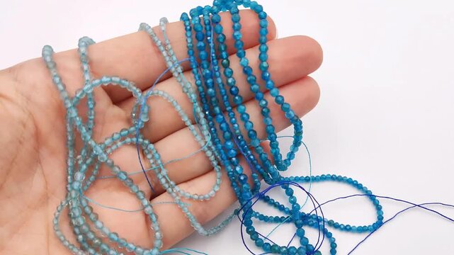 These natural blue apatite stone beads feature a multifaceted cut on high quality stringing wire for creating elegant custom jewelry designs and professional accessory crafting projects