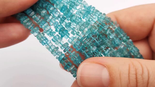 These radiant blue apatite stone beads feature a unique square faceted cut on flexible stringing wire for crafting professional custom jewelry and elegant handmade accessory designs