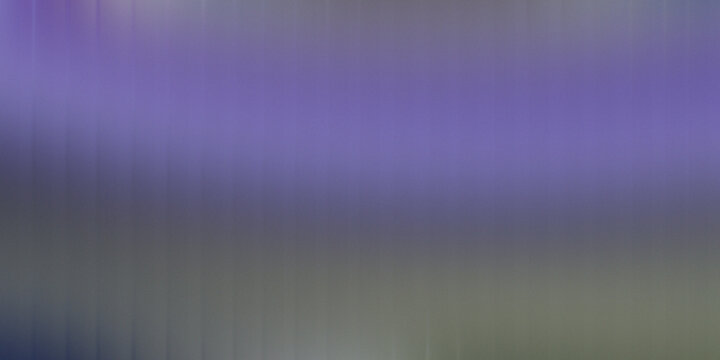 three purple flowers are growing in the snow with green leaves and a blurry background of trees and snow