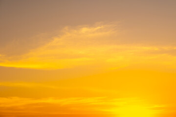 Fototapeta premium Enjoy a panoramic view of the skyline. The sun rises in the morning sky with colorful clouds. and beautiful cloud patterns In the soft light of the morning 