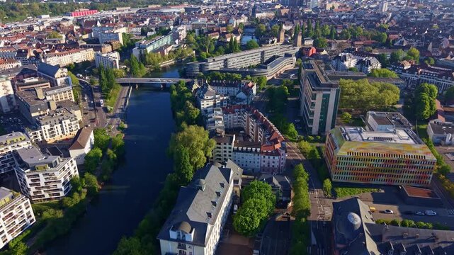 Hotel d'Alsace building and modern architecture along Ill river in Heyritz district in Strasbourg, France