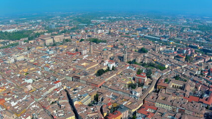 Obraz premium 4K aerial drone image of Parma, Italy. Panoramic summer cityscape featuring the historic Duomo, Baptistery, and Palazzo della Pilotta.