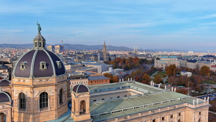 Obraz premium 4K aerial drone image of Vienna, Austria. Beautiful autumn cityscape skyline featuring historic museum architecture and the distant Rathaus.