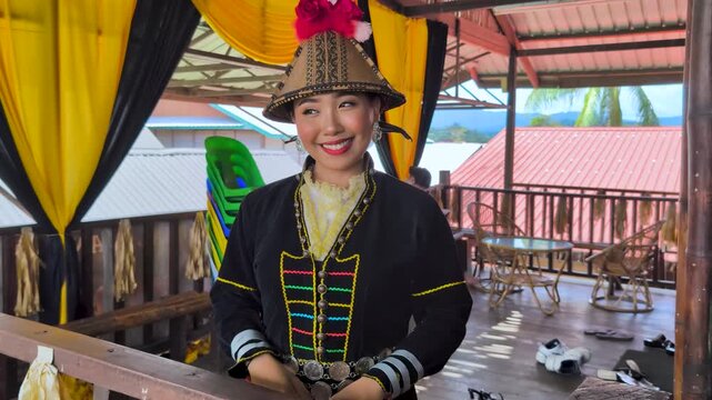 Portrait of Kadazan Dusun girl in Papar traditional attire during Kaamatan Festival in Kota Kinabalu Sabah Malaysia