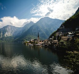Obraz premium Picturesque Autumn Landscape of Hintersee Lake with Vibrant Foliage and Mountains