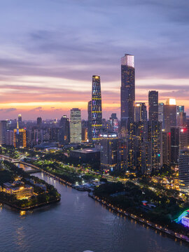 Aerial View of Guangzhou Skyline at Sunset with River Reflection