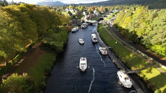 4K Aerial Drone Shot Flying Back Toward Lock Chambers at Fort Augustus in the Parish of Boleskine and Abertarff, South‑West End of Loch Ness