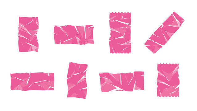 Set of pink crumpled foil wrapper shapes isolated on white