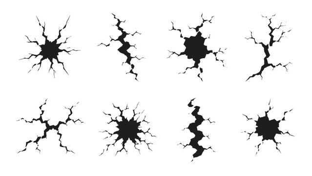 Set of black cracked ground and wall break shapes