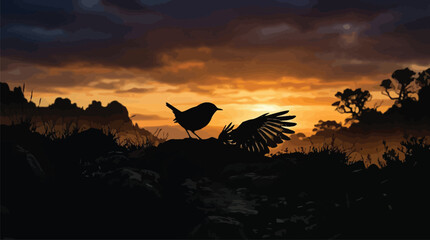 Naklejka premium Silhouette of bird on rocky hill at sunset with golden sky background.