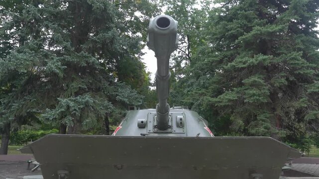 Soviet MT-LB armored personnel carrier on display in green park.