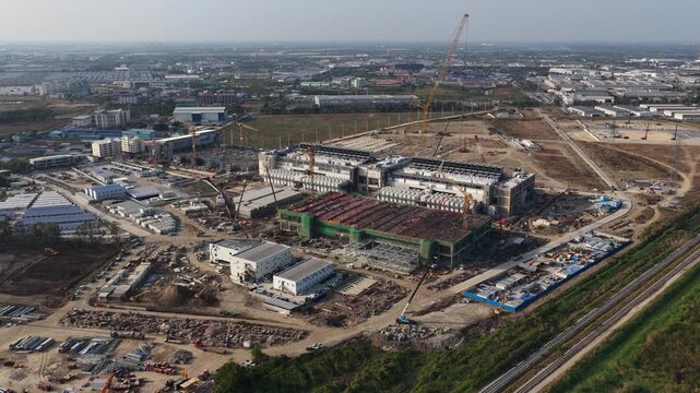Aerial drone view of a data center under construction in Chonburi, Thailand, showcasing hyperscale AI infrastructure, cloud computing systems, and large scale IT technology development.