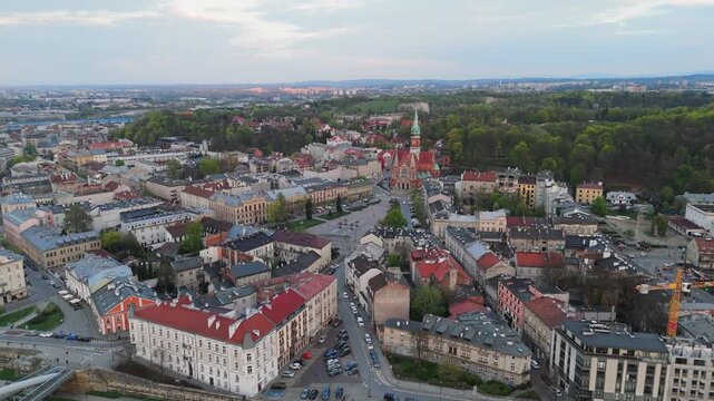 An aerial flyover of Krakow's Old Town with a view of St. Joseph's Cathedral on a spring evening.