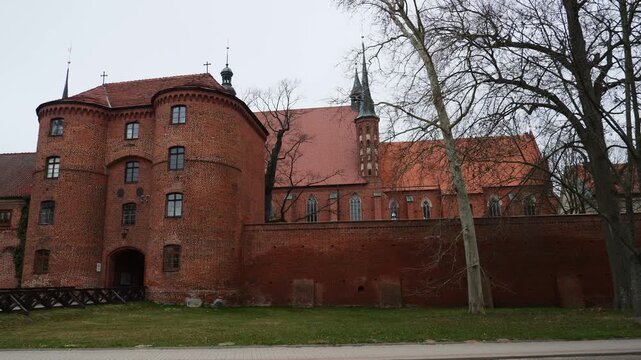 South gate to the historic walled complex of Frombork. Poland.