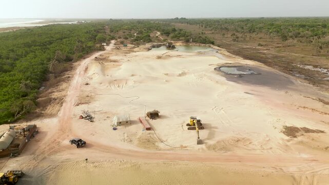 aerial view open pit zircon mine in Abene in Sengal in Africa, exploitation of resources in natural protected area