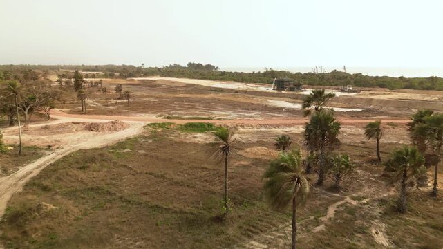 aerial view open pit zircon mine in Abene in Sengal in Africa, exploitation of resources in natural protected area