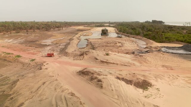 aerial view open pit zircon mine in Abene in Sengal in Africa, exploitation of resources in natural protected area