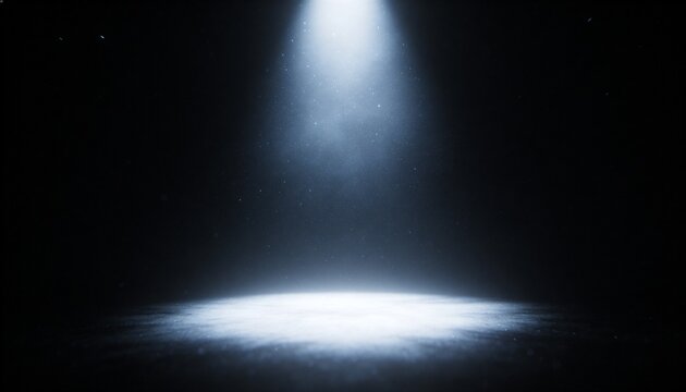Casting overhead spotlight forming visible beam and circular pool on studio floor, with dust motes