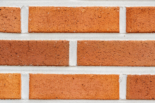Close-Up of Orange Brick Wall Texture